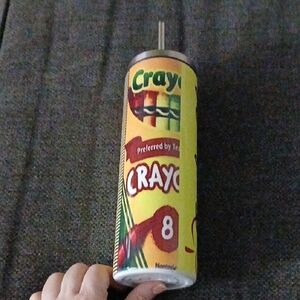 Crayola Colorful Crayola  drinking 20 oz Hogg tumbler w/ Yellow and Red Design.